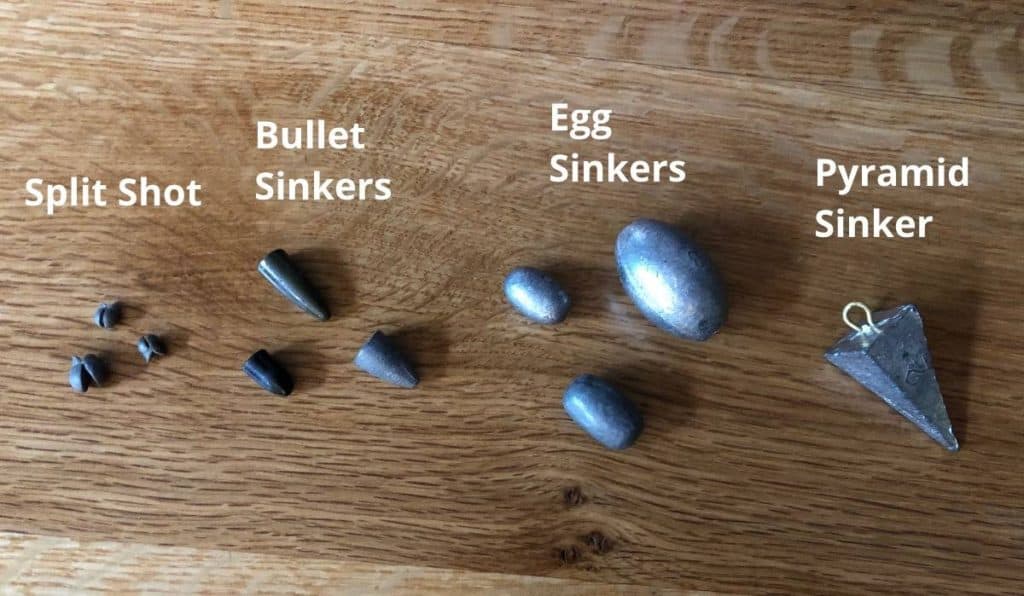 assorted types and sizes of fishing sinkers