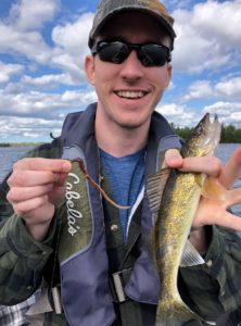 andrew juran-holding-small-walleye-and-nightcrawler