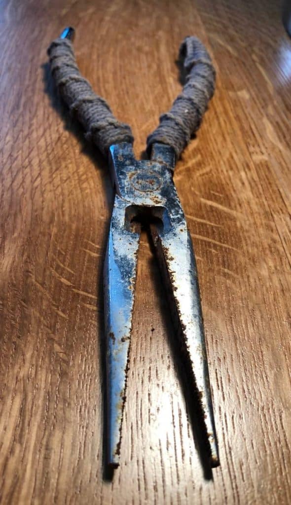 rusty needlenosed fishing pliers