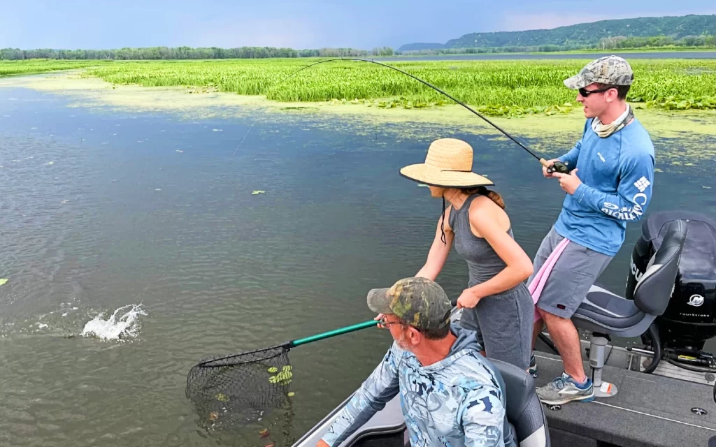 andrew juran ornella juran and papa juran catching bass with st croix premier casting rod