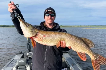 andrew juran holding Huge Northern Pike Caught on Lake Superior