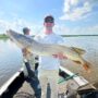 andrew juran holding Huge Northern Pike Caught with Shimano Curado K baitcasting reel