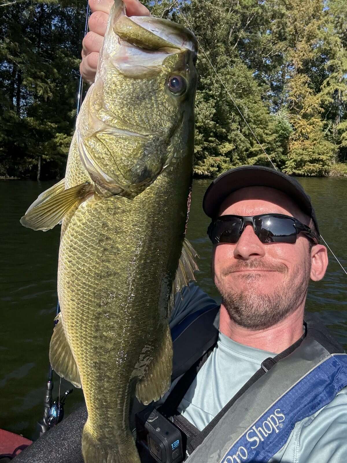 Andrew Juran holding a bass